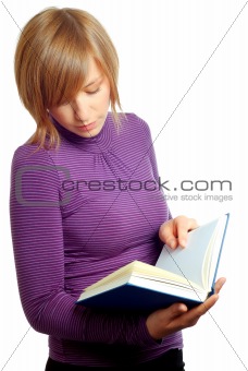 attractive blonde woman reading a book