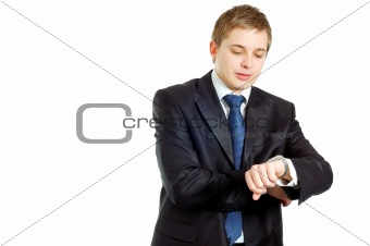 handsome businessman checking his wrist-watch