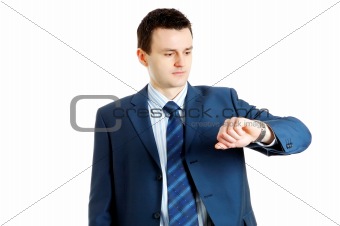 handsome businessman checking his wrist-watch
