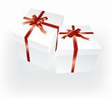 gift boxes with red ribbons