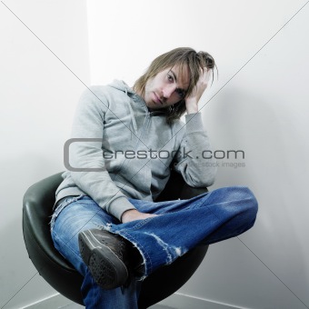 Man seated casually in chair