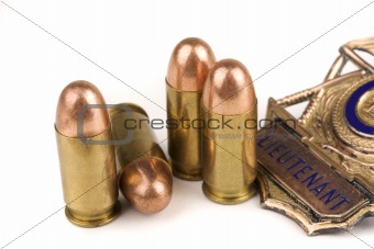 Bullets and police badge
