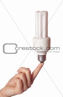 Fluorescent light bulb on female hand.Isolated on white.