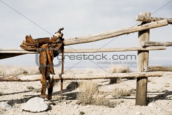 ranch - saddle on fence