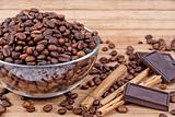 coffee beans,cinnamon sticks and chocolate
