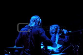 Drummer and blue light
