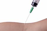 Close up of syringe needle before taking blood