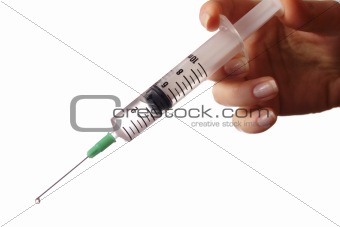 Hand holding syringe.Isolated on white.