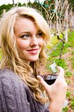 Beautiful young woman in a vineyard