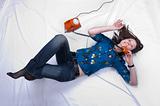 You and me talking with each other. Girl on the red(orange) phone lays on a bed  