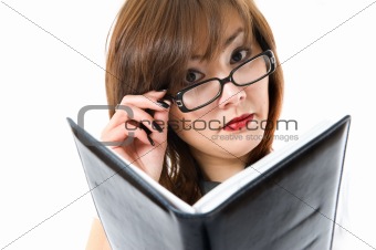 The young japanese business woman looking at note
