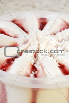 Detail of ice cream with fruit syrup