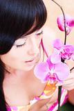 Asian girl with orchid