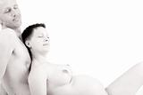 naked couple in love and pregnant