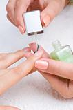 applying manicure, moisturizing the nails