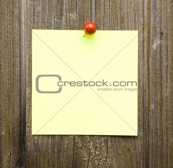 Note On Wooden Background