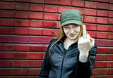Young woman showing middle finger