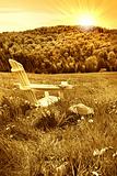 Relaxing on a summer chair in a field