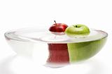 Green and red apples in vase with water -3