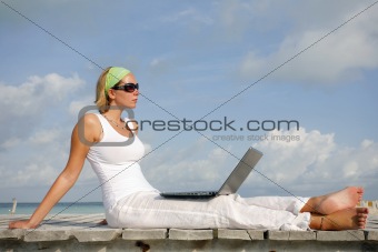 Woman on Jetty with Laptop