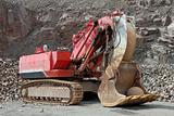 Excavator in a stone pit