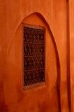 Window on a red arab style wall