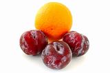Plums and orange.
