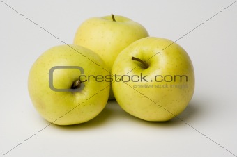 Three yellow apples