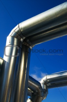 Industrial zone, Steel pipe-lines on blue sky