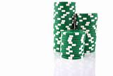 3 part stacks of green casino chips 