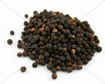 Close up of Black Mustard Seeds on a white background