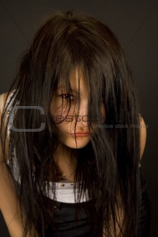 Sensual girl looking through hair