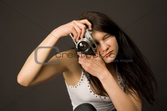 Fashion girl with camera