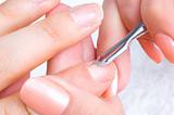 manicure applying - cleaning the cuticles 