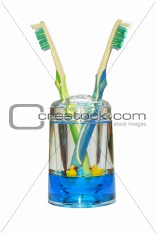 glass with tooth-brushes