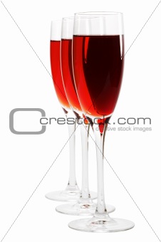 Three glasses with red wine