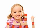 Happy girl with wooden blocks