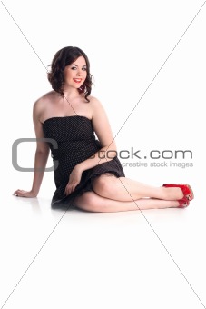 Cute brunette girl in pin-up pose