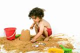 boy playing in the sand