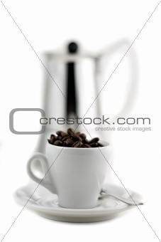 mocca maker and coffee cup isolated on white background