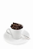 coffee cup with beans isolated on white, Shallow depth of field
