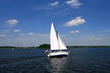 Sailboat, sailing over a river