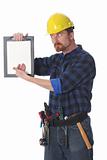 construction worker wonderfully looking on documents 