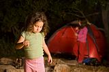 two girls at a camp site