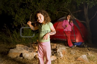 two girls at a camp