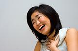Laughing Oriental woman