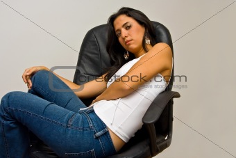 Latina sitting in chair