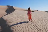 Young Girl Playing on Sand Dunes