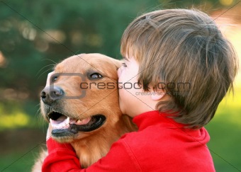 Boy Kissing Dog
