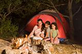 camping mother and daughters
